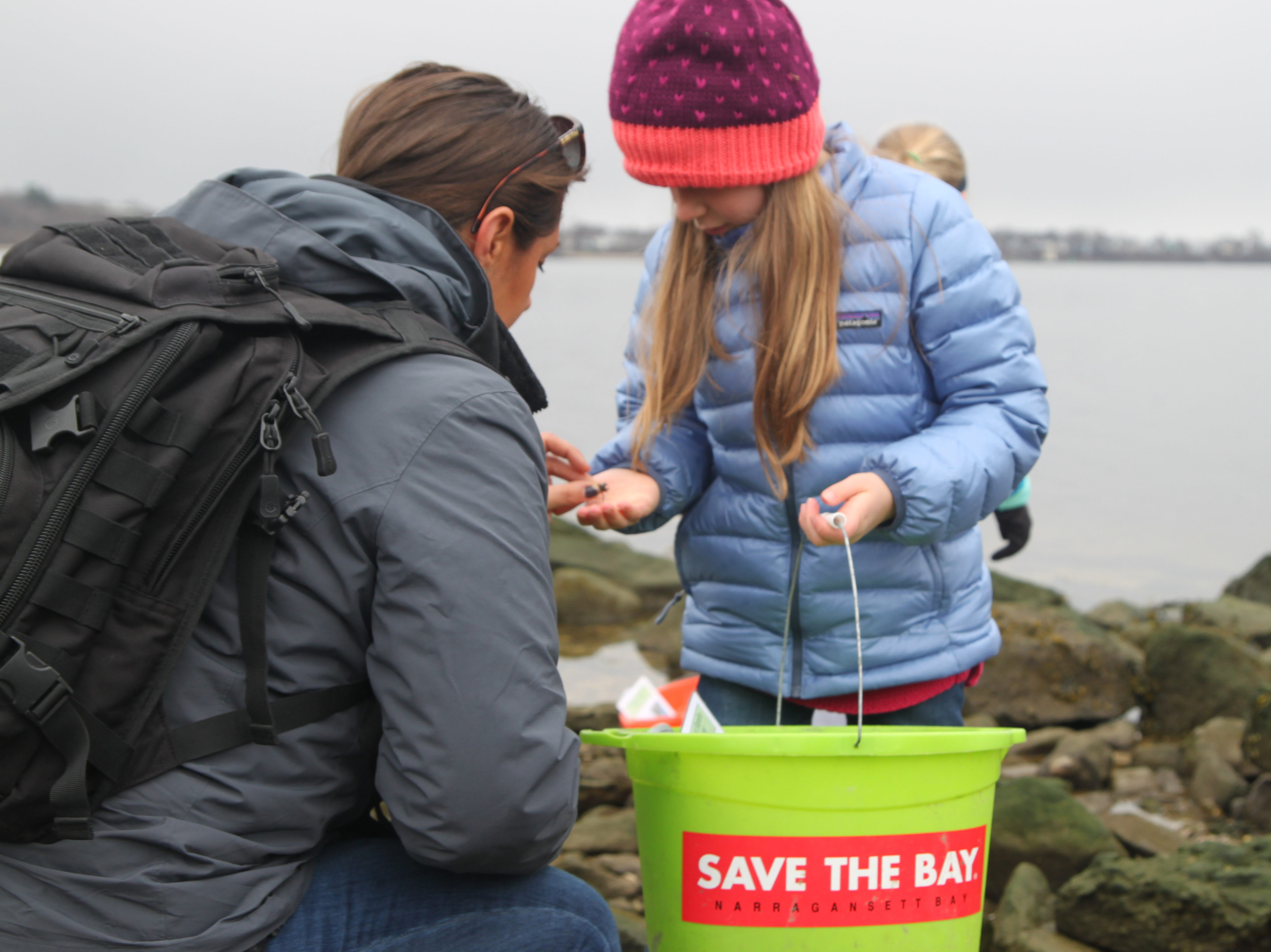 Students-by-Bay-with-Save-The-Bay-bucket